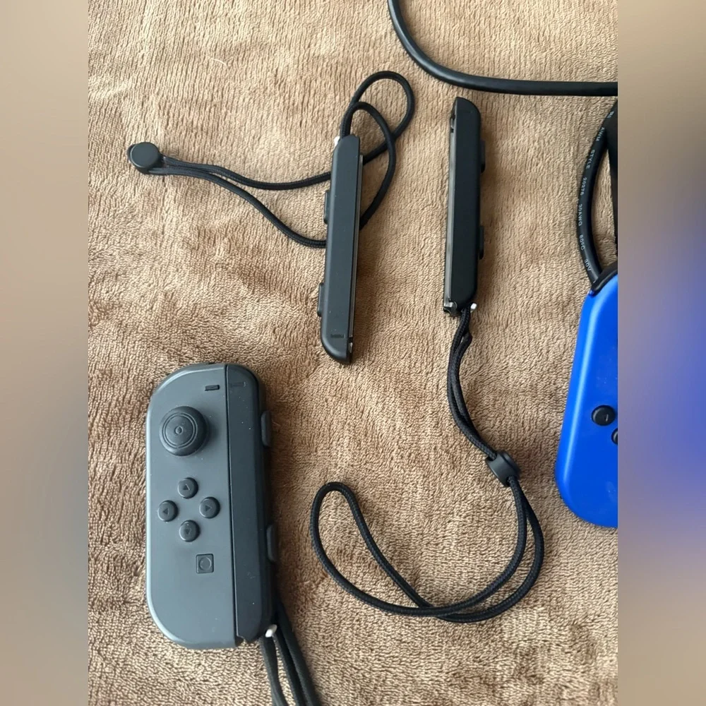 Nintendo Switch with Blue, Yellow and Gray Joy-Con